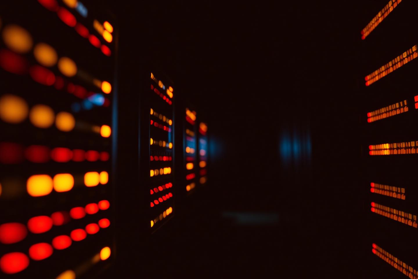 Server racks glowing in the dark
